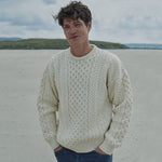 A823 Aran Fisherman Merino Wool Crew Neck Sweater White Lifestyle Creative Irish Gift.