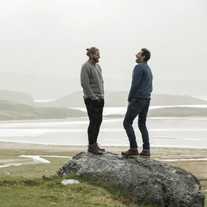 CG623-NVYMD Men's Donegal Tweed Roll Neck Aran Sweater Gray Lifestyle View  Creative Irish Gifts